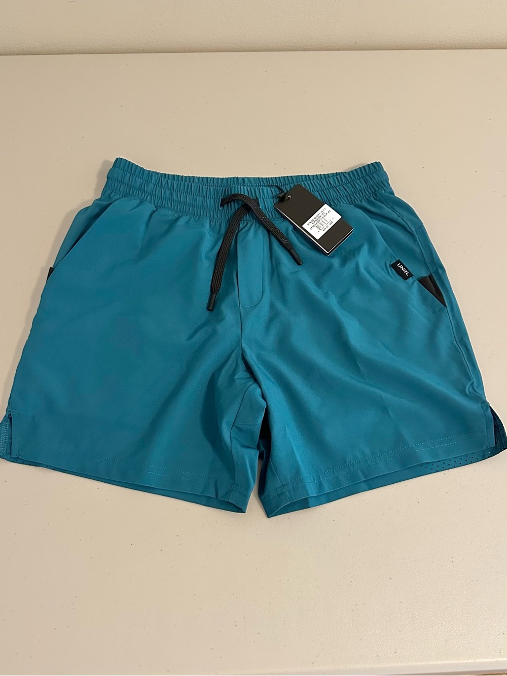 UNRL Stride 5.5” Superior Shorts XS Teal Performance Running Gym Shorts NWT